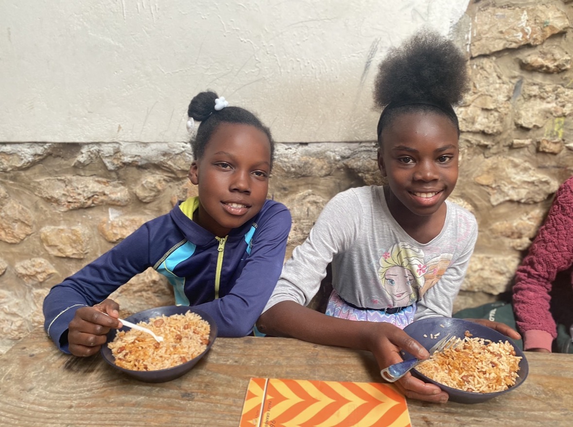 Children enjoying a meal in Belize